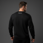 Man wearing a black sweatshirt with 'GYMWEAR' branding on the back against a gray background